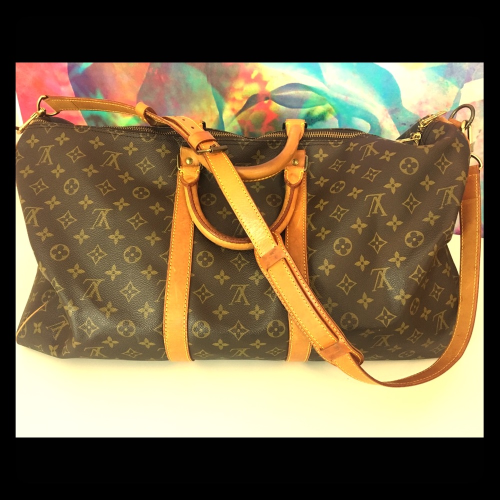 Louis Vuitton Keepall 55 Bandolier with strap.
